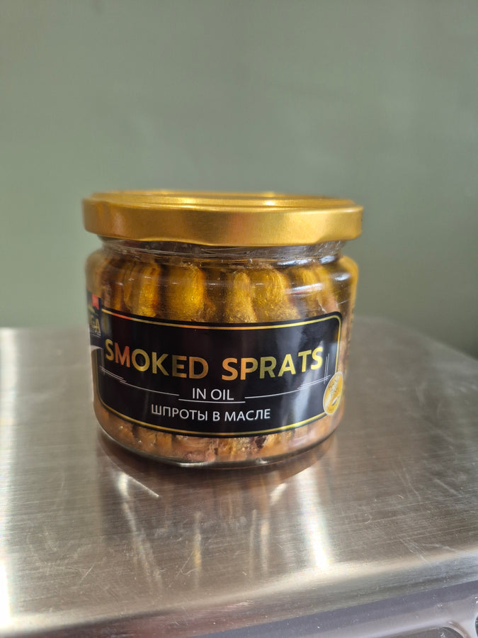 Smoked sprats in oil glass jar